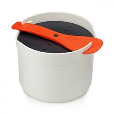 Cooking pot with lid, colander, measuring cup and rice paddle - Joseph Joseph's microwave rice cooker has everything you need to create your favorite dinners in a snap.
