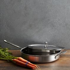 Saut, brown, and sear with the All-Clad D5 6-Quart Saut Pan. This classic pan's large surface area and tall, straight sides prevent splattering and allow for easy turning with a spatula. As with all cookware from All-Clad's D5 collection, this pan is constructed with bonded stainless steel for exceptional heating, especially in induction cooking. Its stick-resistant, 18/10 stainless steel interior and long, comfortable handle will make this an essential tool in your kitchen. It includes two riveted stainless steel handles and a lid. For Saut ing, Searing, Browning, and More Deeper than traditional fry pans, this saut pan has more surface area and tall, straight sides that hold in juices, prevent splattering, and allow for easy turning with a spatula. Ideal for a range of foods, the saut pan allows you to brown or sear, then deglaze or finish in liquid-all in one pan. This 2-quart pan has both a loop handle and a long handle, both made of cast stainless steel. The lid locks in moisture and heat to thoroughly finish meals on the stove or the oven. From All-Clad's D5 Brushed Stainless Steel Collection Cookware from the All-Clad D5 collection feature bonded five-ply construction with alternating layers of stainless steel and aluminum. This layered construction eliminates warping and enables even heating. And with 18/10 stainless steel interiors, D5 cookware is stick-resistant and non-reactive to food. Pieces from this collection feature attractive brushed stainless steel exteriors that complement many kitchen styles. Compatible with a Range of Cooking Surfaces All D5 products are optimized for induction cooking, but also perform well on all stove ranges, in the oven, or under the broiler. The pieces are also dishwasher safe for easy, convenient cleaning.