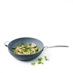 The GreenPan Paris 12&frac12;" wok is made with durable hard-anodized aluminum on the outside and Thermolon healthy ceramic nonstick coating for easy cleanup and food release on the inside. Plus, the helper handle makes it easier to move around the kitchen. hard-anodized aluminum provides quick and even heat distribution Thermolon ceramic coating is healthy, safe and does not contain any toxic chemicals or persistent pollutants no harmful fumes, peeling, chipping or flaking off of the coating PFOA, lead and cadmium free 60 less CO2 is emitted during the curing phase of production of Thermolon coatings, compared to the emissions during the curing phase of production of traditional coatings GreenPan processes used materials-such as upcycled stainless steel for the handles and upcycyled aluminum for cookware bodies-into new products to prevent waste of potentially useful materials stainless steel handles coating is heat resistant to 850&ordm;F Aluminum with stainless steel handle and ceramic nonstick coating. Dishwasher safe. Imported.
