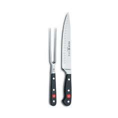 Carving Knives & Forks - Indispensable tools for efficient prep and serving, this Wusthof Classic set lets you slice poultry or meat to exact thickness desired. Hollow-edge blade in this carving knife set ensures smooth release. Indentations reduce drag for quick and efficient slicing, without tearing. PEtec razor-sharp technology creates a precision-edge blade, skillfully honed by hand to maintain sharpness longer. Glides through roasts to create deli-thin slices for platters and sandwiches. Signature to the Wusthof cutlery series is the precision bolster, providing the heft and balance for accurate performance and firm cutting control. Long, straight high-carbon stainless-steel tines on the carving fork pierce quickly and cleanly to anchor poultry, roasts or ham. Knife and fork handles of this carving set feature triple-compression rivets securing each high-impact handle to the full tang for superior strength and longevity. Knife blade is precision-forged, high-carbon rust-free stainless-steel. Hand wash. Mad - Specifications Model: 9740-1 Knife: 8"L blade; 5 1/4-oz. Fork: 6"L tines; 4 1/4-oz. Made in Germany Lifetime manufacturer warranty Care and Use Wusthof cutlery series is dishwasher-safe, but hand washing is recommended. In the dishwasher, Wusthof blade and tines may bang against other cutlery or pots and pans and nick the stainless-steel. Clean with a wet cloth and dishwashing detergent. Dry immediately, from the back of the handle to the blade/tines. No metal is completely stain-free. To prevent slight tarnishing, be sure to remove acidic juices or foods (lemon, mustard, ketchup, etc.) after use. If there are signs of staining, clean with a nonabrasive metal polish. To prevent irreparable blade damage, it is best to store knife in a knife block or in-drawer knife tray.