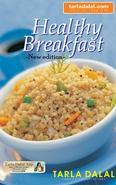 The saying "Have breakfast like a king, lunch like a prince and dinner like a pauper" is completely true. Breakfast is your start of the day and as the name suggests it is necessary to "break" the "fast" that has been going on since dinner the previous night to fuel your body for the day. A good breakfast keeps you energetic and healthy as it provides the necessary as it provides the necessary nutrient boost and prevents bingeing on high calorie foods in latter part of the day. Healthy Breakfast, my newly revised edition of the Total Health Series, comprises of 42 sumptuous breakfast ideas. All the recipes in this book are made with commonly available ingredients. Care has been taken to avoid high fat, processed and refined foods and use low calorie natural variants instead. Recipes have been complied using combination of fruits and vegetables with cereals and pulses and minimal use of fat. One days when you are on the go, try out recipes from the section on Breakfast in a Jiffy and Breakfast using left-overs and on weekends you can make an elaborate dish to please your dear ones from the section on Breakfast with a Little Planning while all office-goers who have breakfast at work can try recipes from Tiffin Breakfast section. Also included is a section on Healthy Drinks and Butter Substitutes. Turn to this book to add more colour, flavour, nourishment and variety to the most important meal of the day and ensure good health for the day and ever&hellip;not just for yourself but for your entire family. This ePub book has beautiful images for each recipe and each ingredient is linked to a detailed glossary so that its easy for a beginner to understand every recipe. Happy cooking for morning meals! Welcome to the digital version of Tarla Dalal's Healthy Breakfast! You can now carry your cookbook with you wherever you go. Although this book contains the same delicious and inspiring recipes as the print version, you might find the look-and-feel a bit different, due to